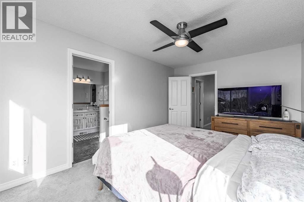 28 Crystal Shores Heights, Okotoks, Alberta  T1S 2K8 - Photo 21 - A2281479