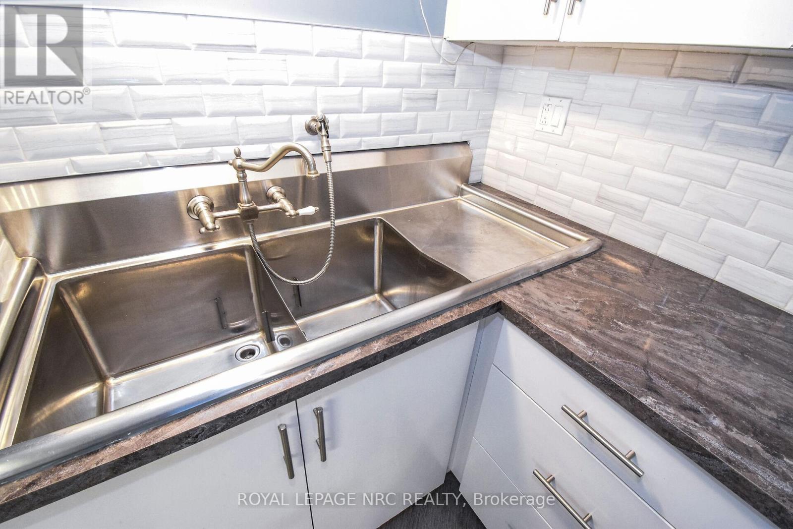 8 Roseland Avenue, St. Catharines, Ontario  L2M 5Z2 - Photo 25 - X12791214