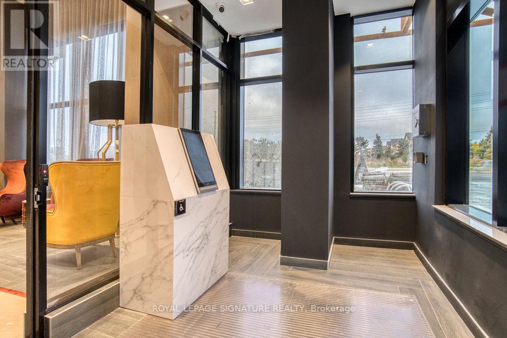 715 - 395 Dundas Street W, Oakville, Ontario  L6M 5R8 - Photo 4 - W12791250