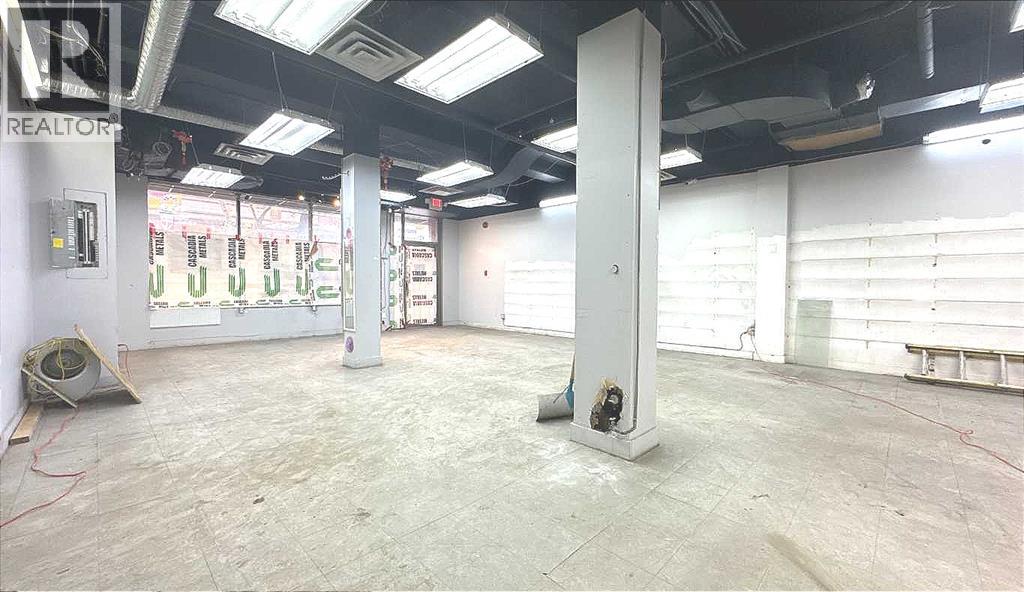 105, 233 Centre Street SW, Calgary, Alberta