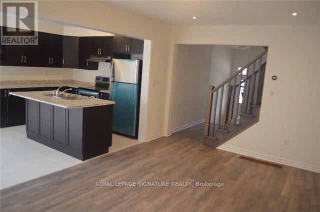 311 Beasley Terrace, Milton (Fo Ford), Ontario  L9E 1C5 - Photo 3 - W12791408