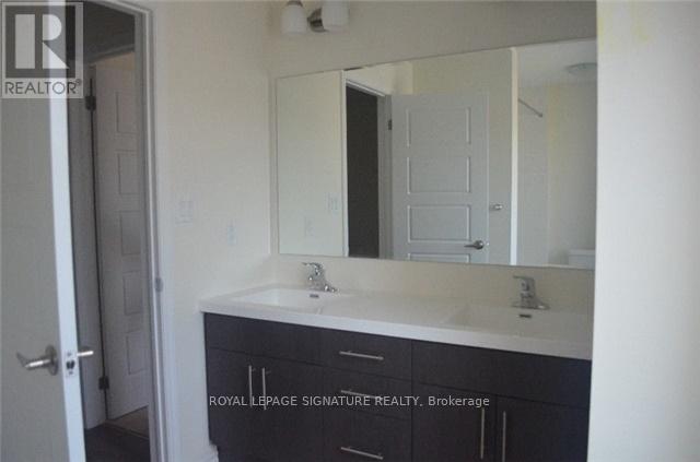 311 Beasley Terrace, Milton (Fo Ford), Ontario  L9E 1C5 - Photo 4 - W12791408