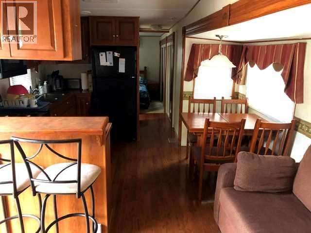 561 Carefree Resort, Rural Red Deer County, Alberta  T4G 0K6 - Photo 2 - A2286689