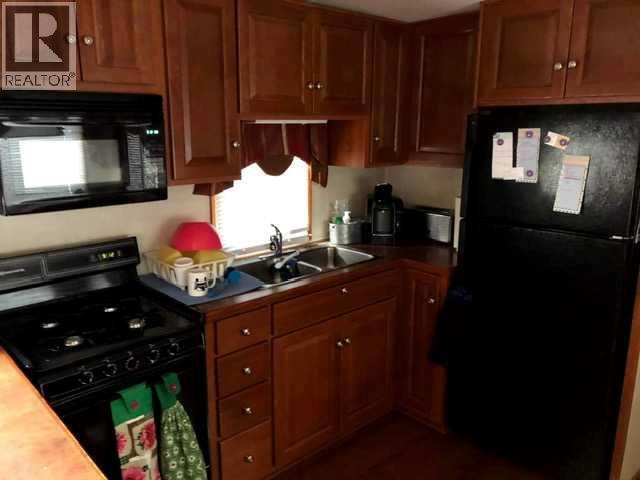 561 Carefree Resort, Rural Red Deer County, Alberta  T4G 0K6 - Photo 4 - A2286689