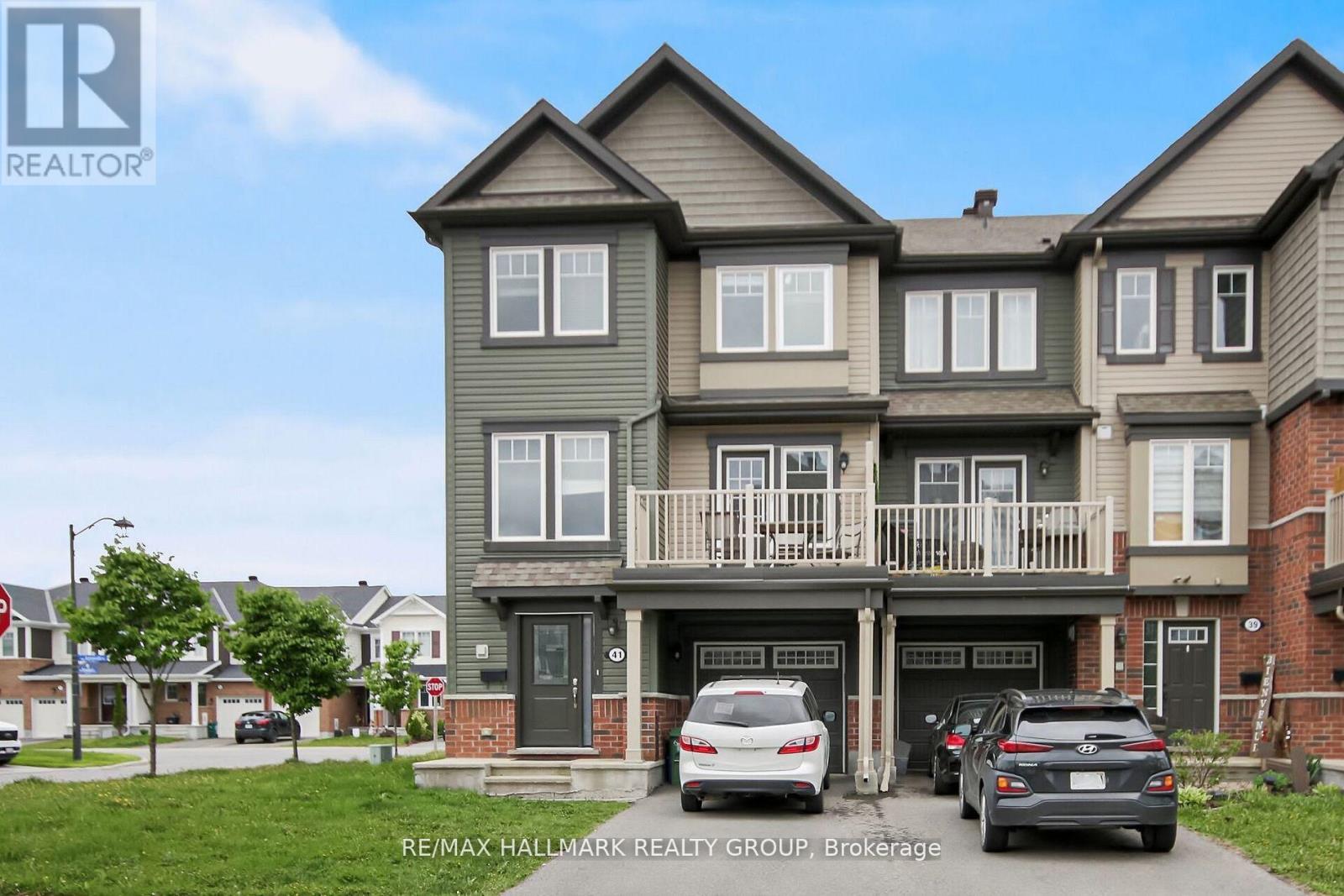 Welcome to this beautiful and bright end-unit townhome in the highly sought-after Summerside community of Orleans! This stylish 3 bed, 2 bath home boasts modern finishes and an impressive amount of living space. Step into a spacious and light-filled foyer featuring a convenient powder room, laundry area with a brand-new washer and dryer, interior garage access, and a bonus storage room. The second level offers a stunning open-concept layout that seamlessly blends the living, dining, and kitchen areas. Large windows flood the space with natural light, while a generous balcony provides the perfect spot to enjoy your afternoon coffee or unwind in the fresh air. Upstairs, youll find 3 well-sized bed, including a primary suite with a walk-in closet. The 2 bath is beautifully appointed with quality finishes, enhancing the overall charm and comfort of the home. Located close to top-rated schools, parks, shopping, public transit, and recreation facilities, this home offers both convenience and an exceptional lifestyle. (id:48254)