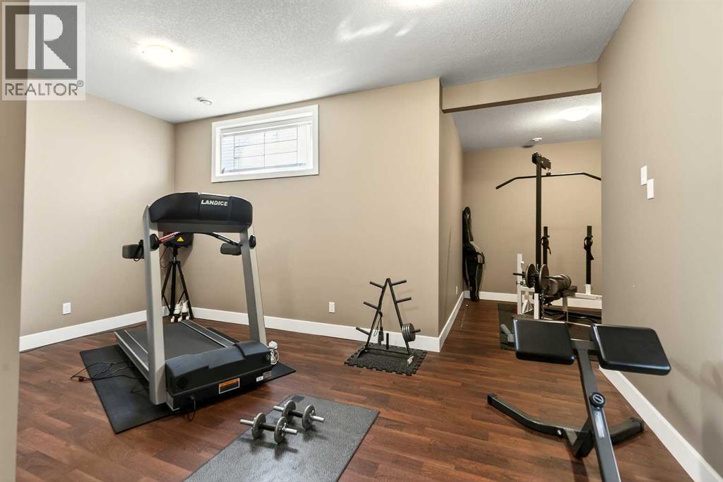 106 Montenaro Crescent, Rural Rocky View County, Alberta  T4C 1A5 - Photo 20 - A2285057