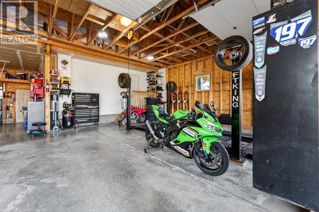 106 Montenaro Crescent, Rural Rocky View County, Alberta  T4C 1A5 - Photo 26 - A2285057