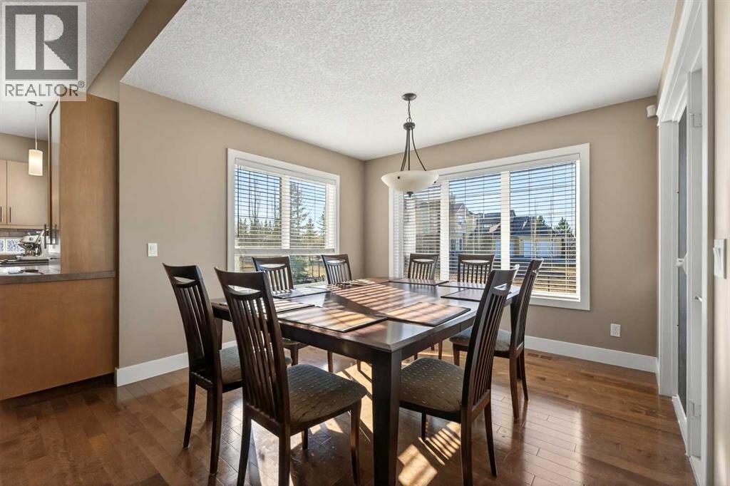 106 Montenaro Crescent, Rural Rocky View County, Alberta  T4C 1A5 - Photo 5 - A2285057