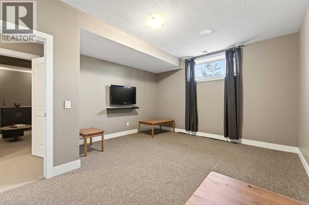 106 Montenaro Crescent, Rural Rocky View County, Alberta  T4C 1A5 - Photo 19 - A2285057