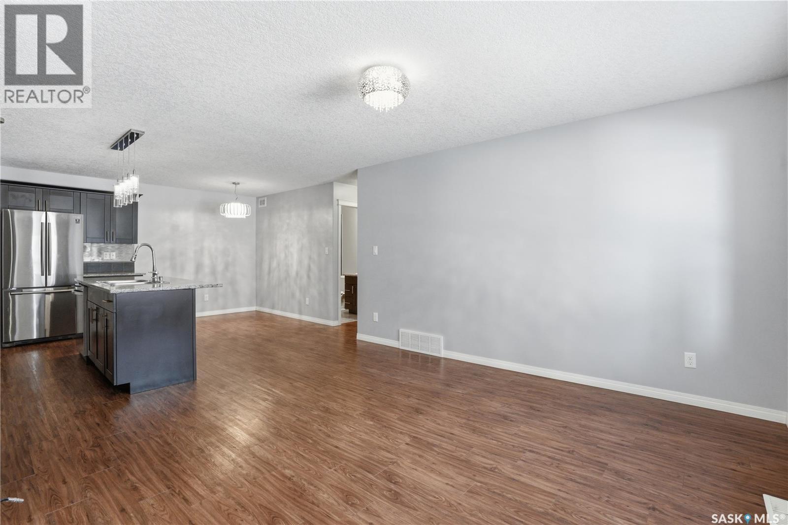 116 125 Willis Crescent, Saskatoon, Saskatchewan  S7T 0T1 - Photo 6 - SK026007