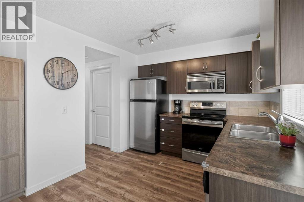 18, 133 Copperpond Heights Se, Calgary, Alberta  T2Z 1C5 - Photo 6 - A2284839