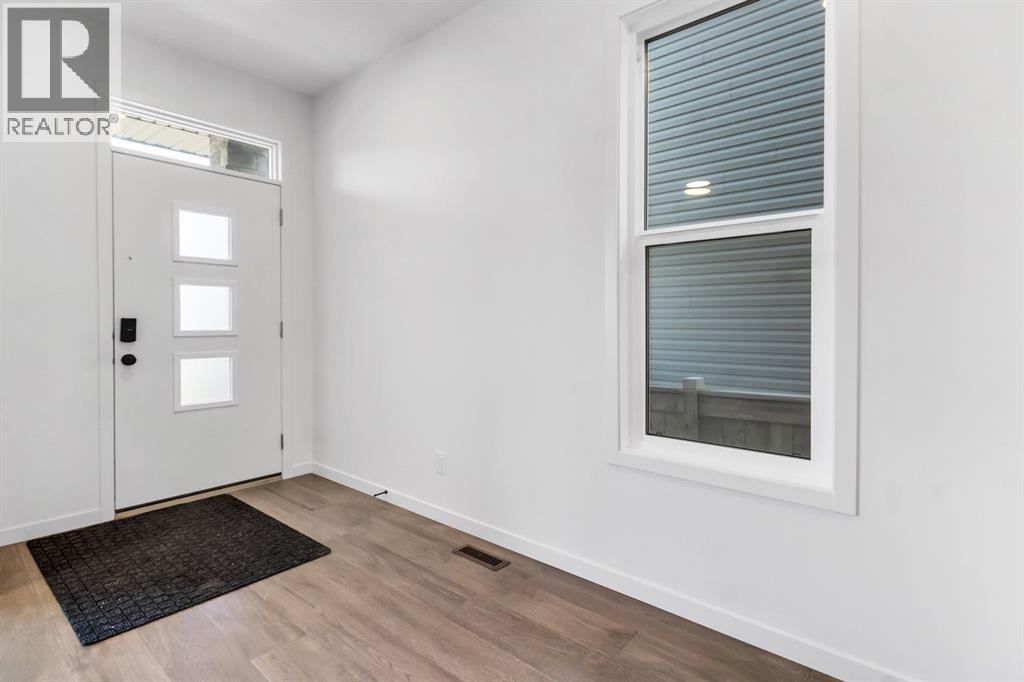 317 Midgrove Link Sw, Airdrie, Alberta  T4B 5K9 - Photo 3 - A2286729