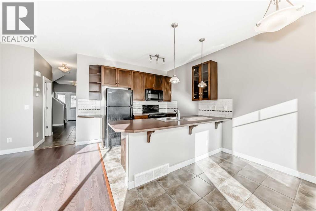 33 Cimarron Vista Gardens, Okotoks, Alberta  T1S 0G2 - Photo 3 - A2263043