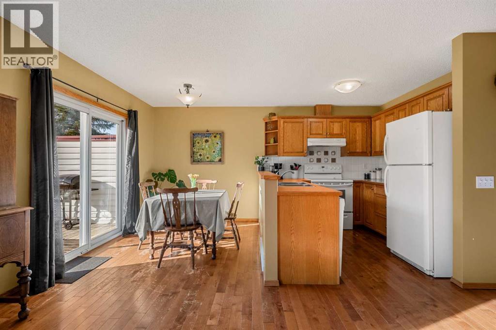 132 Bow Ridge Drive, Cochrane, Alberta  T4C 1V8 - Photo 8 - A2282061