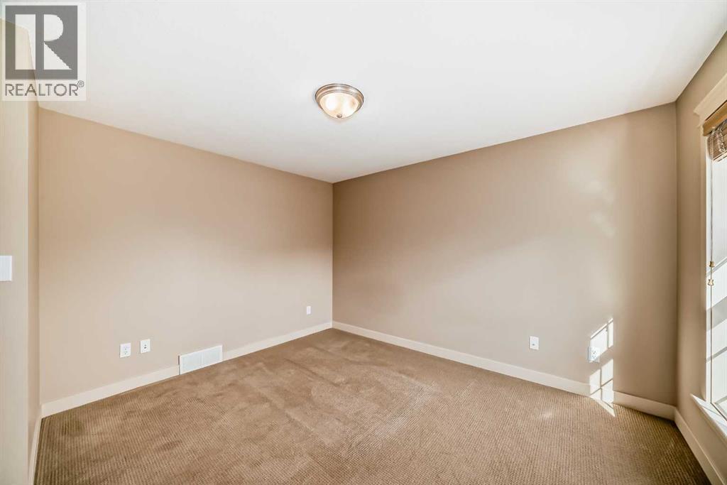 42 Ypres Green Sw, Calgary, Alberta  T2T 6M1 - Photo 27 - A2252885