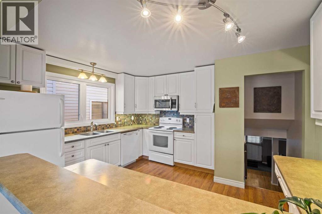 276 Macewan Glen Drive Nw, Calgary, Alberta  T3K 2G4 - Photo 6 - A2285919