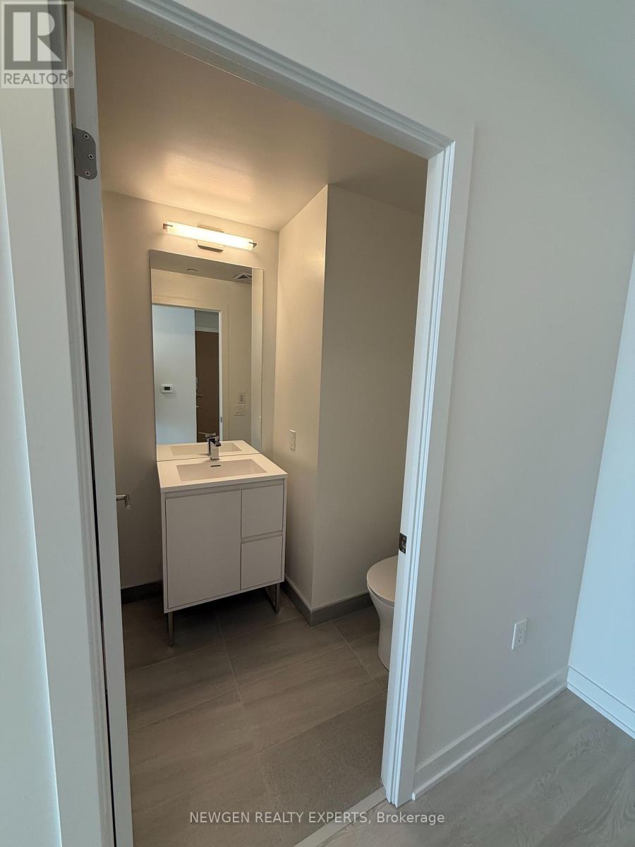 1203 - 1 Quarrington Lane, Toronto, Ontario  M3C 0S4 - Photo 3 - C12792016