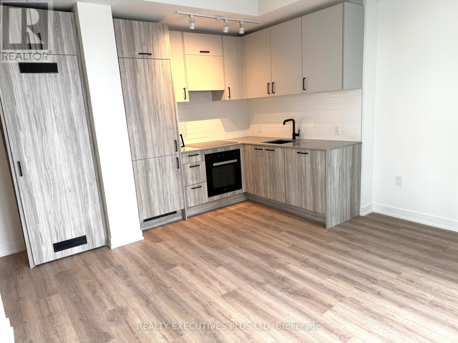 1404 - 1 Quarrington Lane, Toronto, Ontario  M3C 0S4 - Photo 3 - C12792032