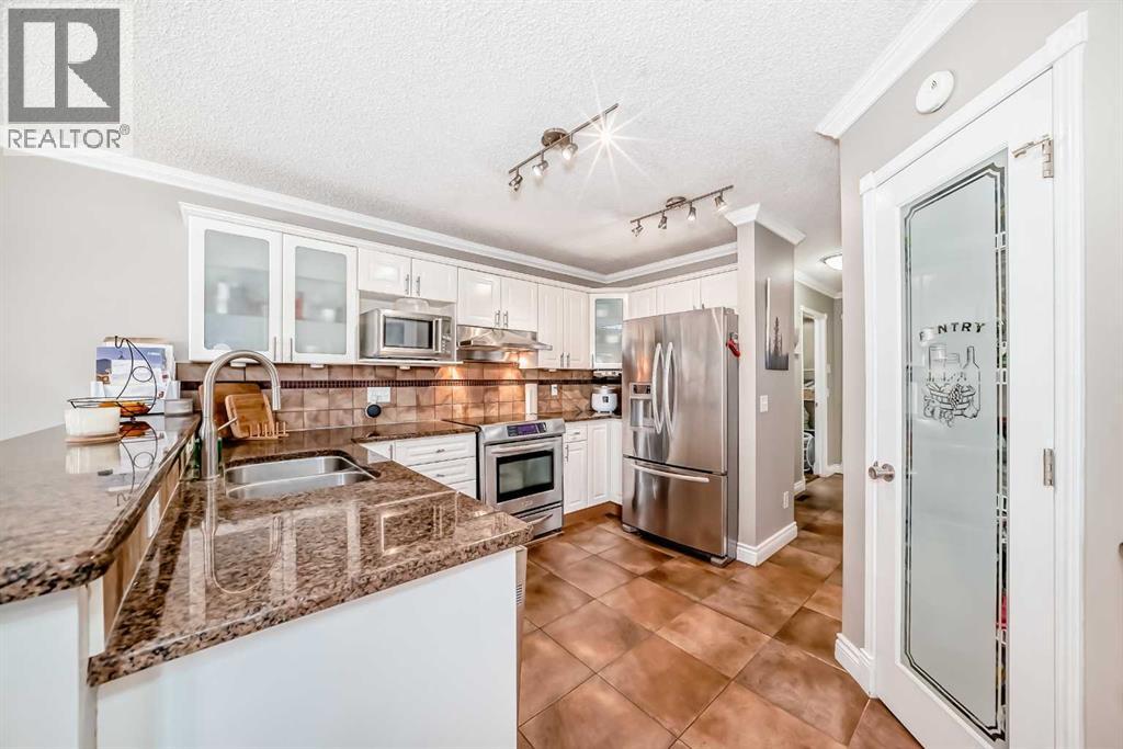 188 Hidden Ranch Crescent Nw, Calgary, Alberta  T3A 5W3 - Photo 5 - A2284849