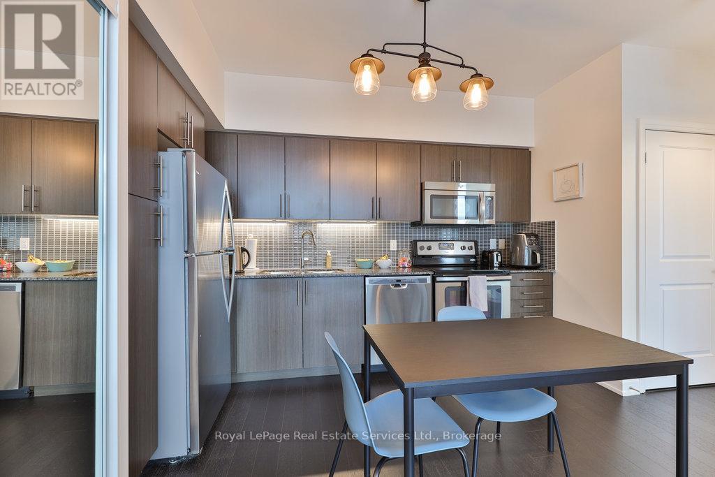 320 - 65 Speers Road, Oakville, Ontario  L6K 0J1 - Photo 11 - W12792212