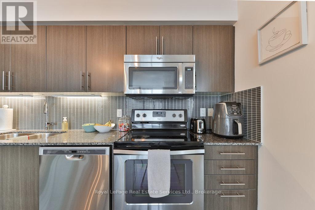 320 - 65 Speers Road, Oakville, Ontario  L6K 0J1 - Photo 15 - W12792212