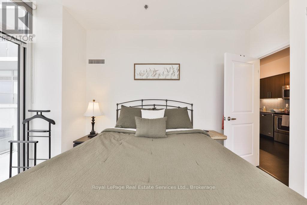 320 - 65 Speers Road, Oakville, Ontario  L6K 0J1 - Photo 18 - W12792212