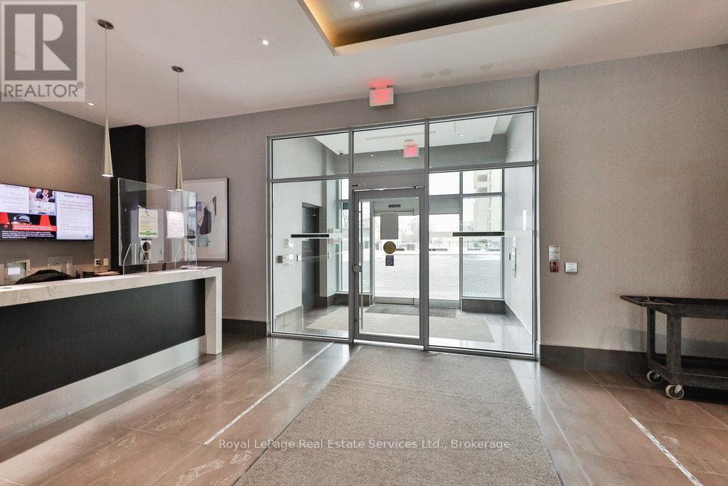 320 - 65 Speers Road, Oakville, Ontario  L6K 0J1 - Photo 2 - W12792212