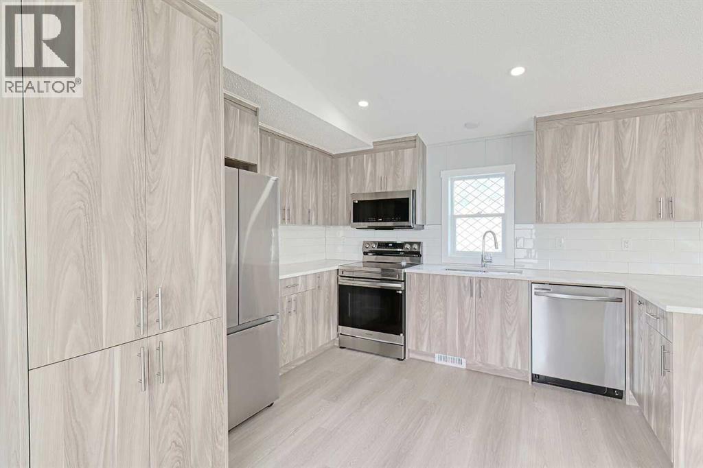 802, 1101 84 Street Ne, Calgary, Alberta  T2A 7X2 - Photo 4 - A2283320