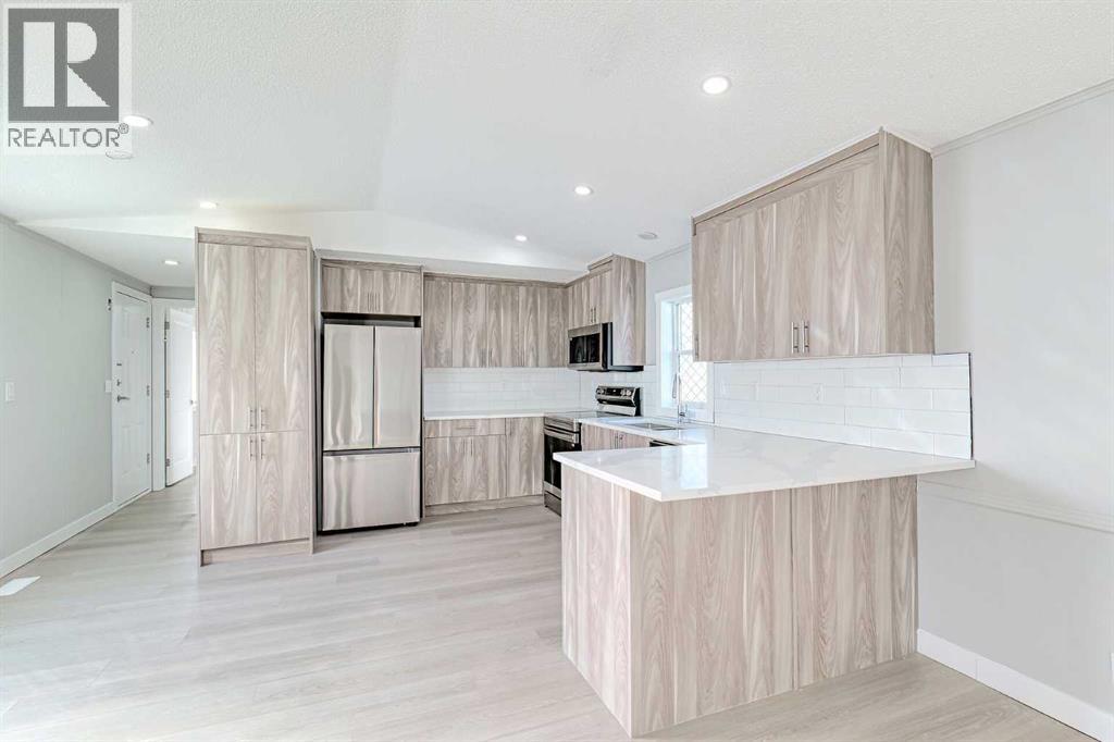 802, 1101 84 Street Ne, Calgary, Alberta  T2A 7X2 - Photo 7 - A2283320