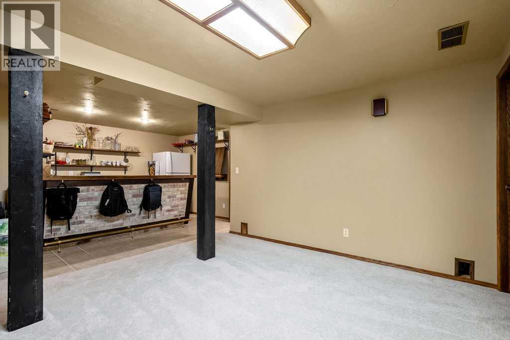 220 Scenic Way Nw, Calgary, Alberta  T3L 1B8 - Photo 27 - A2285871