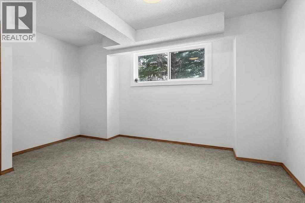 9095 Scurfield Drive Nw, Calgary, Alberta  T3L 1L3 - Photo 31 - A2274494