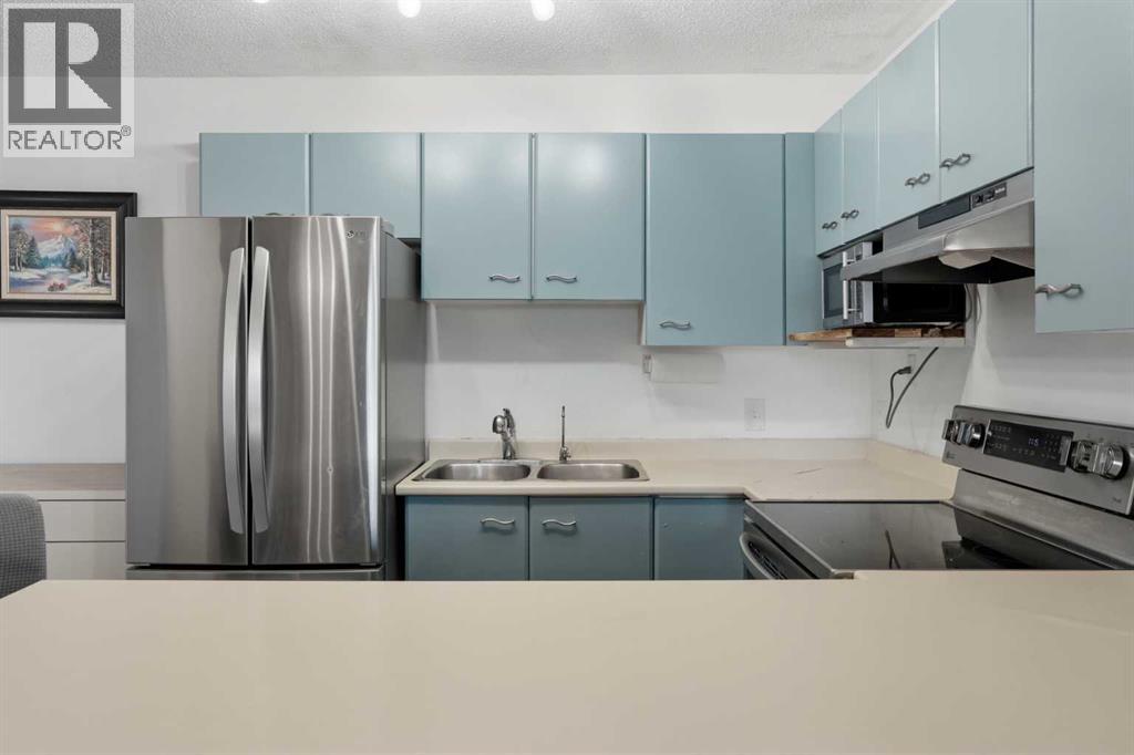 34, 1934 Edenwold Heights Nw, Calgary, Alberta  T3A 3V2 - Photo 5 - A2277548