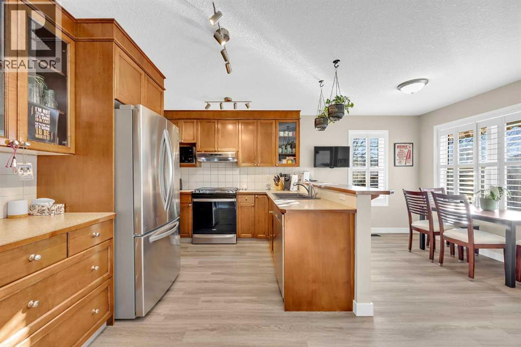 71 Eversyde Heath Sw, Calgary, Alberta  T2Y 4P8 - Photo 7 - A2285086