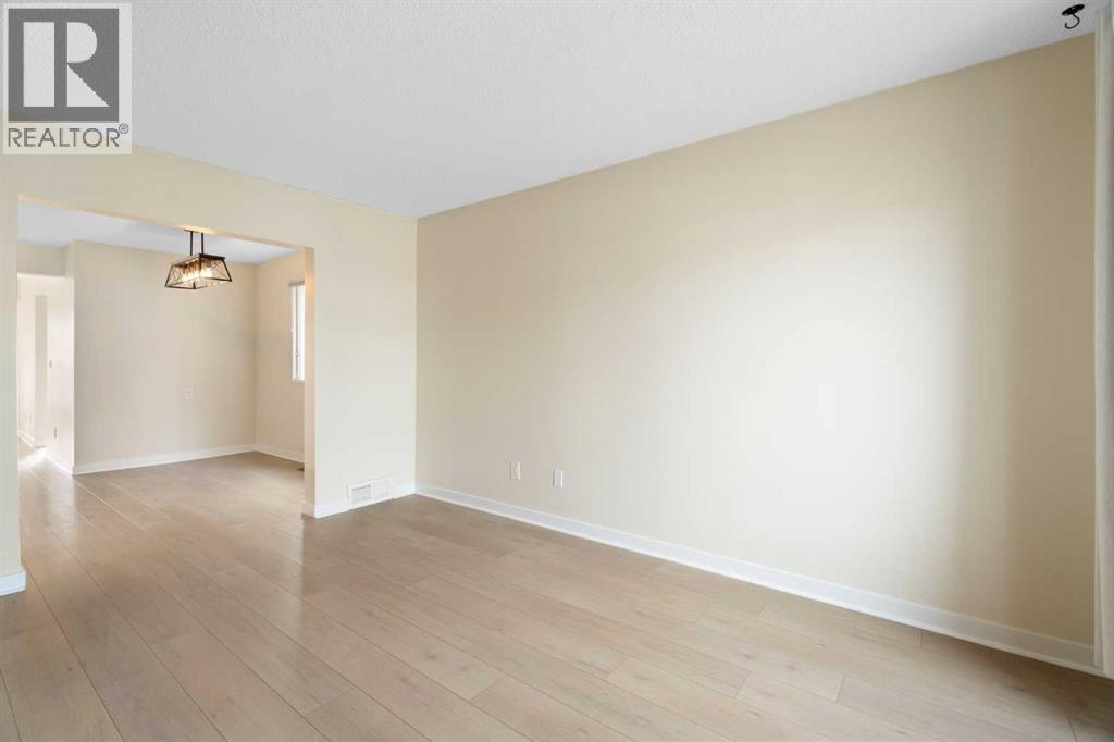 25 Mckernan Road Se, Calgary, Alberta  T2Z 1S7 - Photo 5 - A2286879