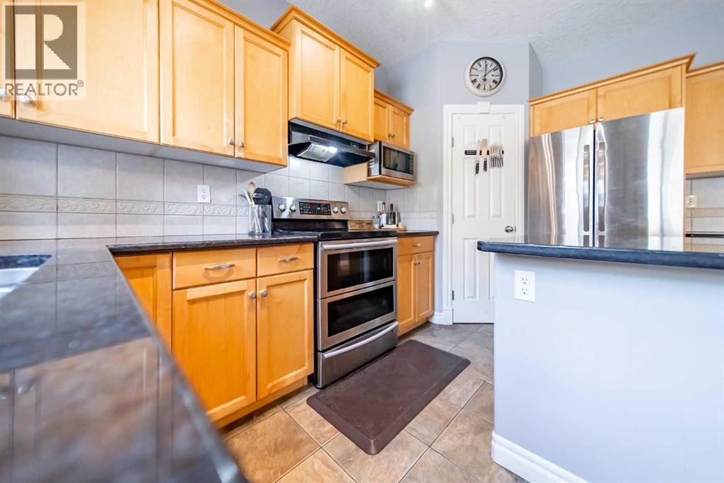 16 Tuscany Ridge Place Nw, Calgary, Alberta  T3L 2K7 - Photo 14 - A2286494