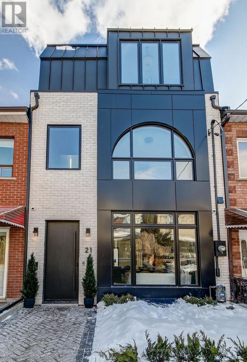 A Rare Opportunity In One Of Trinity-Bellwoods Most Sought-After Streets, 21 Foxley Street Is A Brand New Custom-Built Home That Blends Impressive Scale, Sophisticated Style And Thoughtfully Curated Design. Over 3500sqft Across Multiple Levels, With 10Ft Ceilings On The Main Floor And Primary Suite. This Residence Offers 4 Bedrooms Above Grade And 6 Bathrooms. The Main Floor Features Open Living And Dining Areas, A Chef's Kitchen With Full Pantry Wall, One-Of-A-Kind 9Ft Curved And Fluted Island, Integrated LED Lighting, And Top Of The Line Fisher & Paykel Appliances Including 36" Gas Stove! Flowing Seamlessly To The Family Room With Quartz Fireplace And Backyard Patio, Perfect For Everyday Living And Entertaining. Upstairs, 3 Bedrooms Each With Ensuite Baths, Complemented By A Spacious Laundry Room With Custom Cabinetry And Separate Study. The Third Floor Primary Suite Showcases A Dry Bar/Coffee Station With Beverage/Wine Fridge, Massive Terrace With City Skyline And CN Tower Views, Custom Walk-Through Closet, And Spa-Inspired Ensuite With Fluted Soaker Tub, Integrated LED Lights, 6 Body Jets And Enclosed Water Closet. Lower Level Offers a Fifth Bedroom With Separate Bath, An Equipment Room With Custom Rack And Monitor, A Grand Theatre Room, A Second Laundry Room, And A Spacious Rec Room With A Full Kitchen. Additional Features Include Built-in Indoor And Outdoor Speakers and Eurofase Chandeliers Through-out The House, Central Vacuum, 6 Cameras, Security System And Brand New 12Ft High Double Car Garage With EV Charger. Please Refer To The Feature Sheet For A Complete List Of Premium Finishes And Upgrades. Step To Trinity-Bellwoods Park, Restaurants, And Boutique Shops. (id:48254)