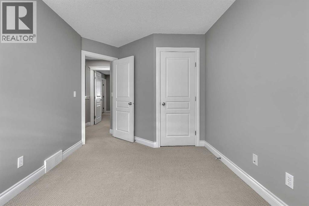 69 Cougar Ridge Mews Sw, Calgary, Alberta  T3H 5P3 - Photo 26 - A2286177