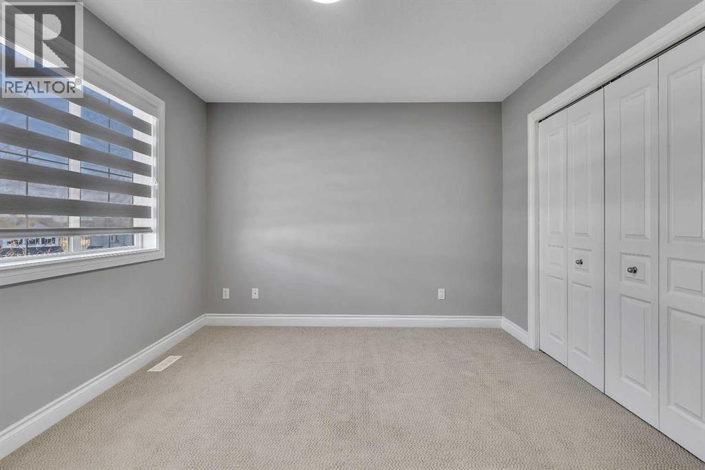 69 Cougar Ridge Mews Sw, Calgary, Alberta  T3H 5P3 - Photo 29 - A2286177