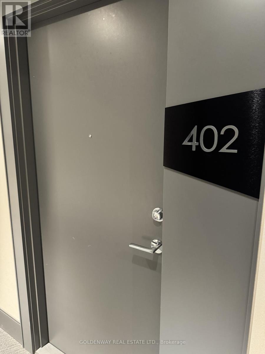 402 - 10 De Boers Drive, Toronto, Ontario  M3J 0L6 - Photo 2 - W12794514