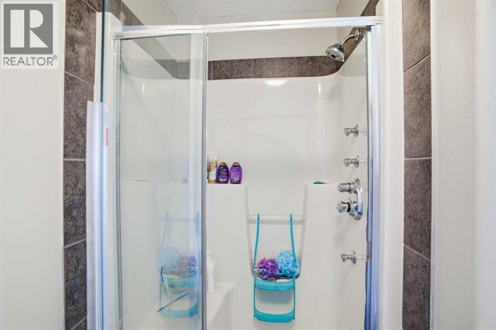 712 Luxstone Landing Sw, Airdrie, Alberta  T4B 3L1 - Photo 33 - A2286053