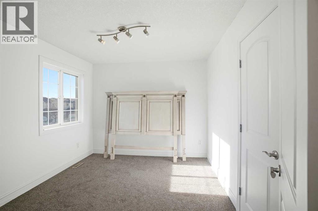 712 Luxstone Landing Sw, Airdrie, Alberta  T4B 3L1 - Photo 35 - A2286053