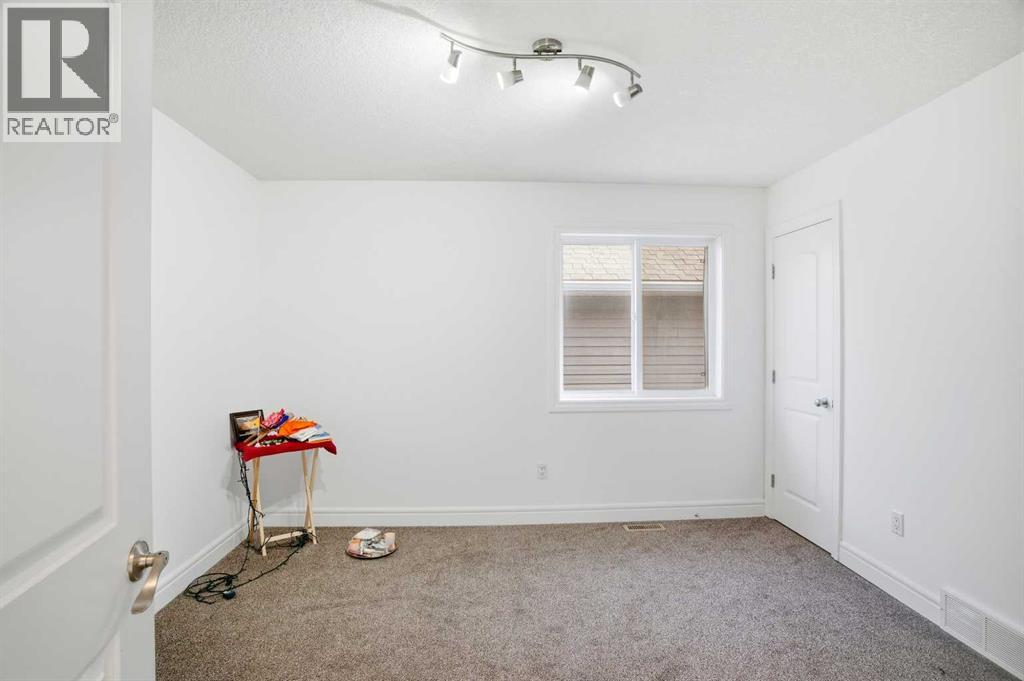 712 Luxstone Landing Sw, Airdrie, Alberta  T4B 3L1 - Photo 37 - A2286053