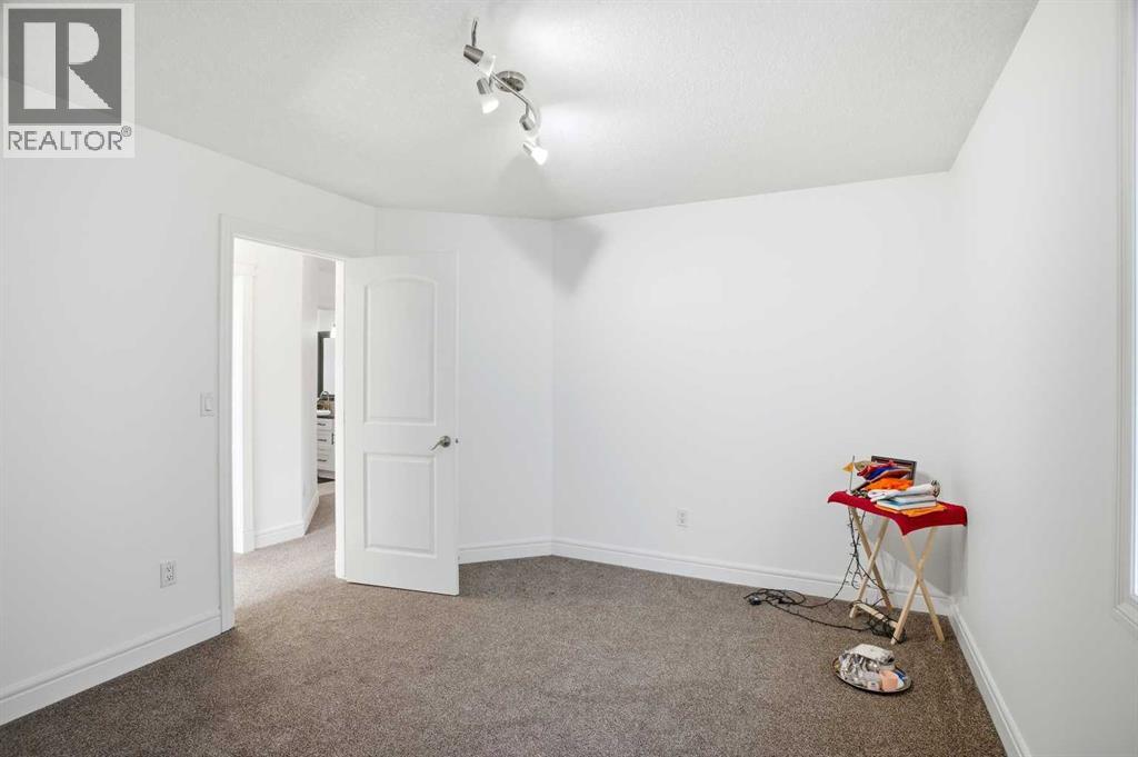 712 Luxstone Landing Sw, Airdrie, Alberta  T4B 3L1 - Photo 38 - A2286053