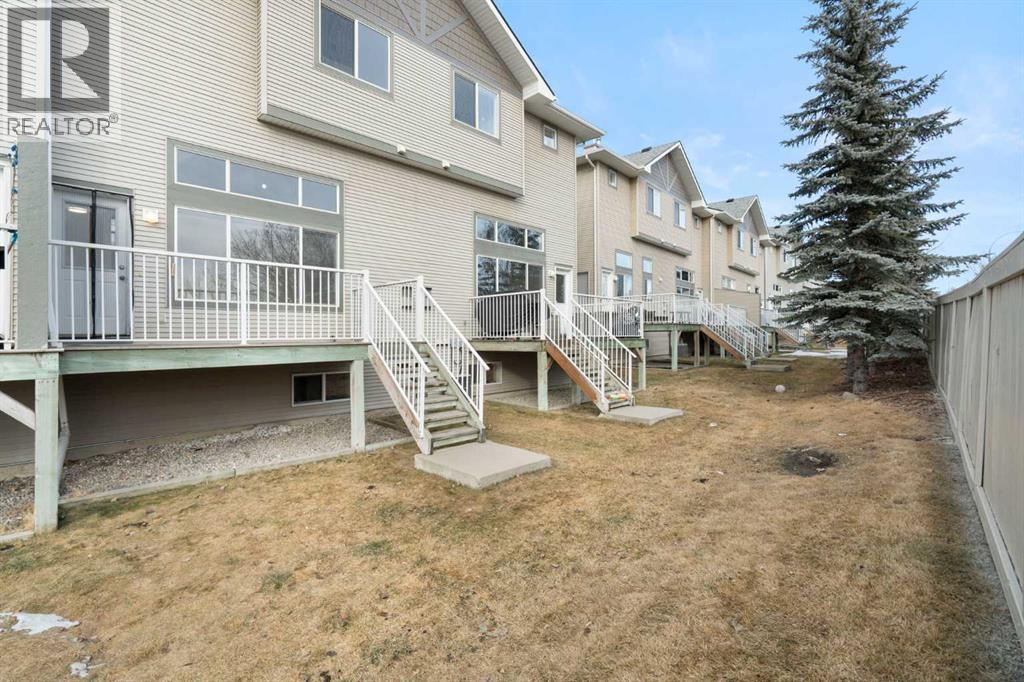 88 Crystal Shores Cove, Okotoks, Alberta  T1S 2B4 - Photo 21 - A2285787
