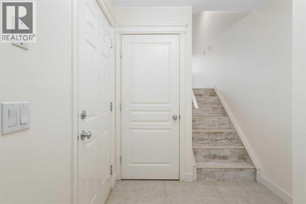 88 Crystal Shores Cove, Okotoks, Alberta  T1S 2B4 - Photo 3 - A2285787