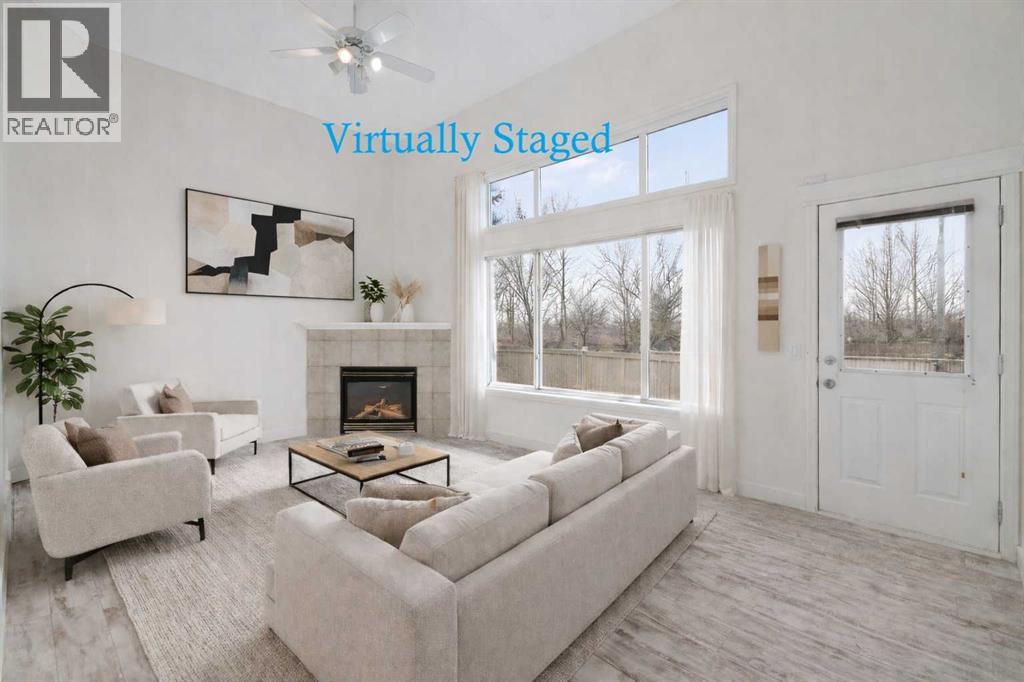 88 Crystal Shores Cove, Okotoks, Alberta  T1S 2B4 - Photo 4 - A2285787