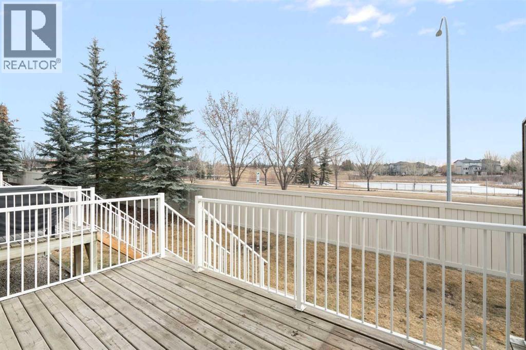 88 Crystal Shores Cove, Okotoks, Alberta  T1S 2B4 - Photo 19 - A2285787