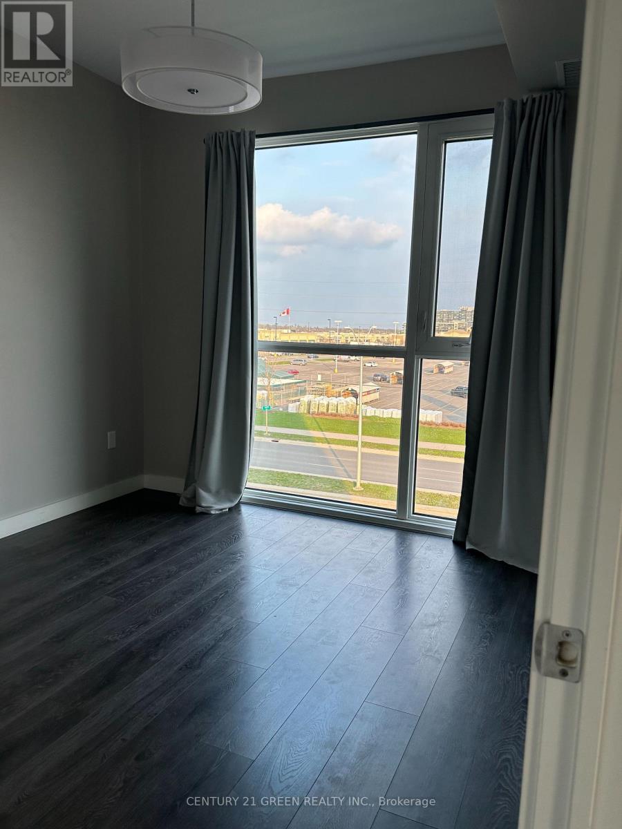 403 - 210 Sabina Drive, Oakville, Ontario  L6H 0W6 - Photo 7 - W12794814