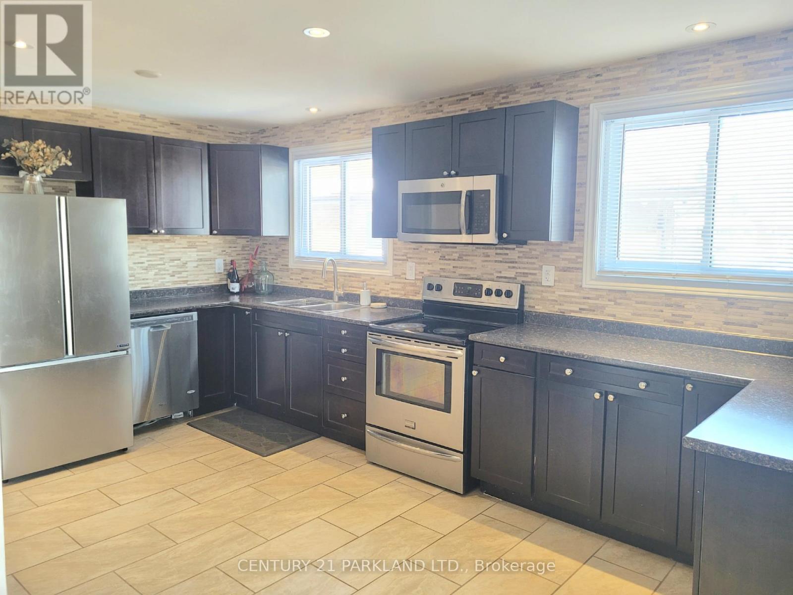 52 Franel Crescent, Toronto, Ontario  M9L 1B7 - Photo 12 - W12665112