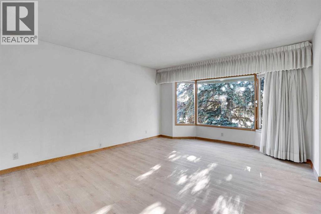 1956 Kelwood Drive Sw, Calgary, Alberta  T3E 3Z3 - Photo 7 - A2275340